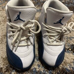 Kids White and Blue Jordan 12’s
